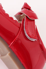 Red bow mary jane shoes