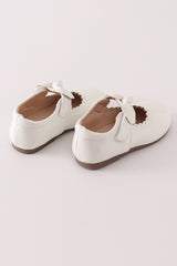 White bow mary jane shoes