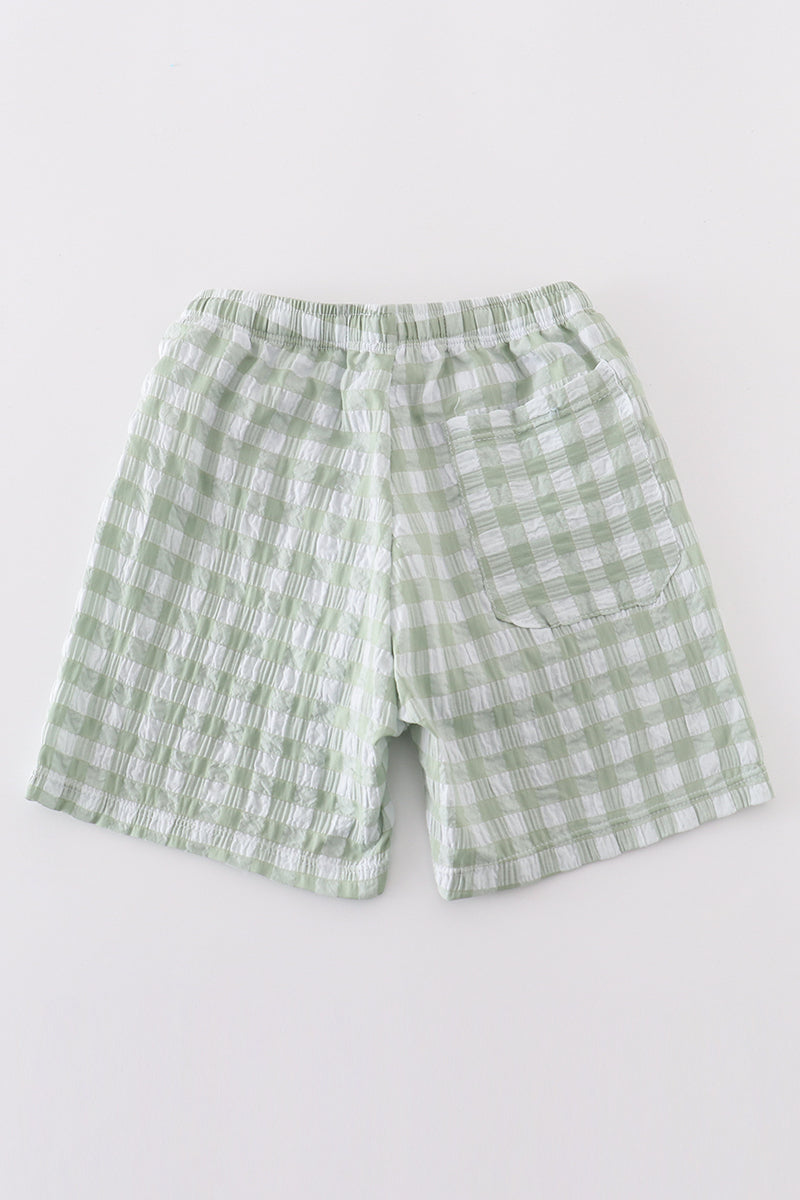 Green seersucker gingham boy swim trunks