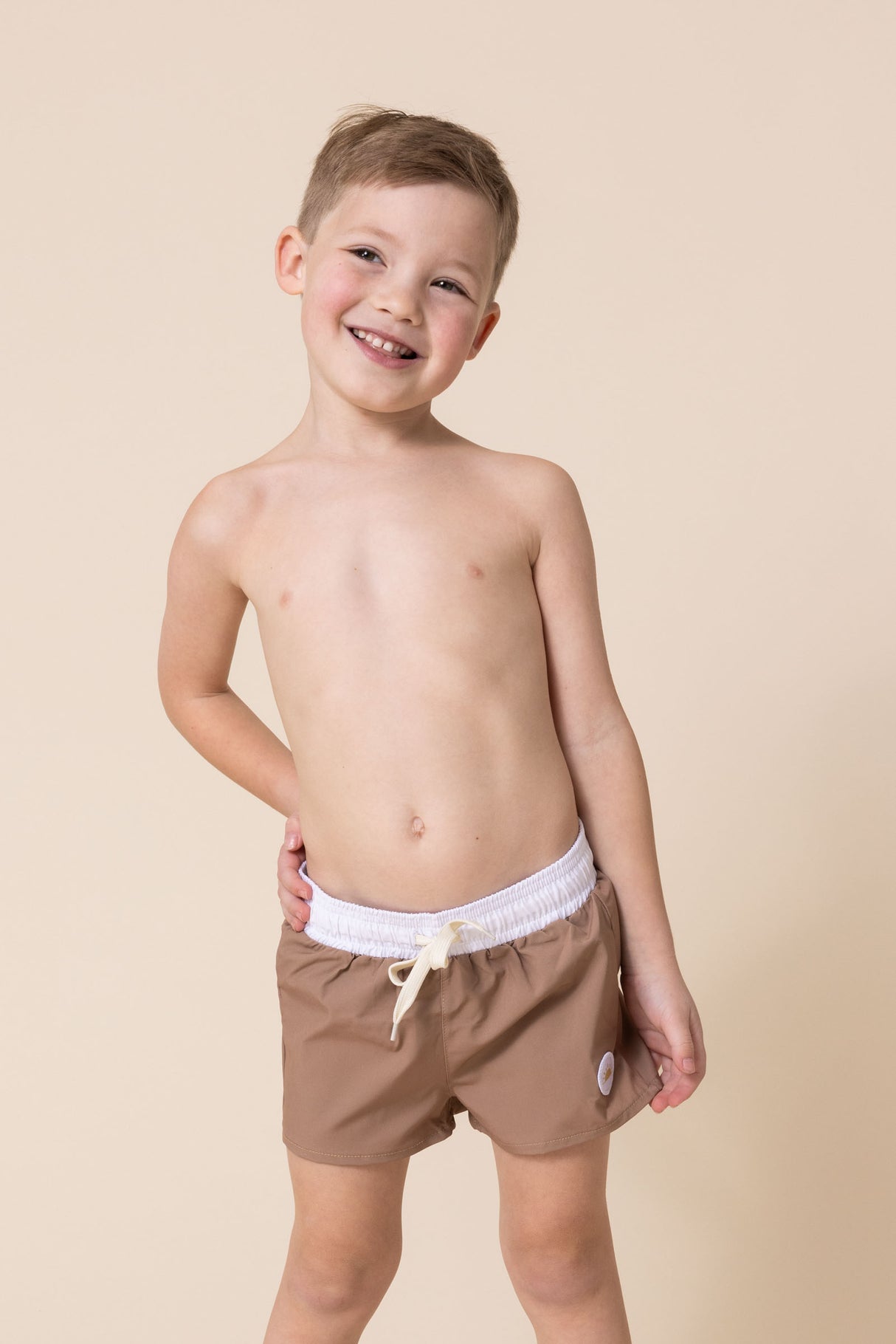 Brown boys swimming trunks